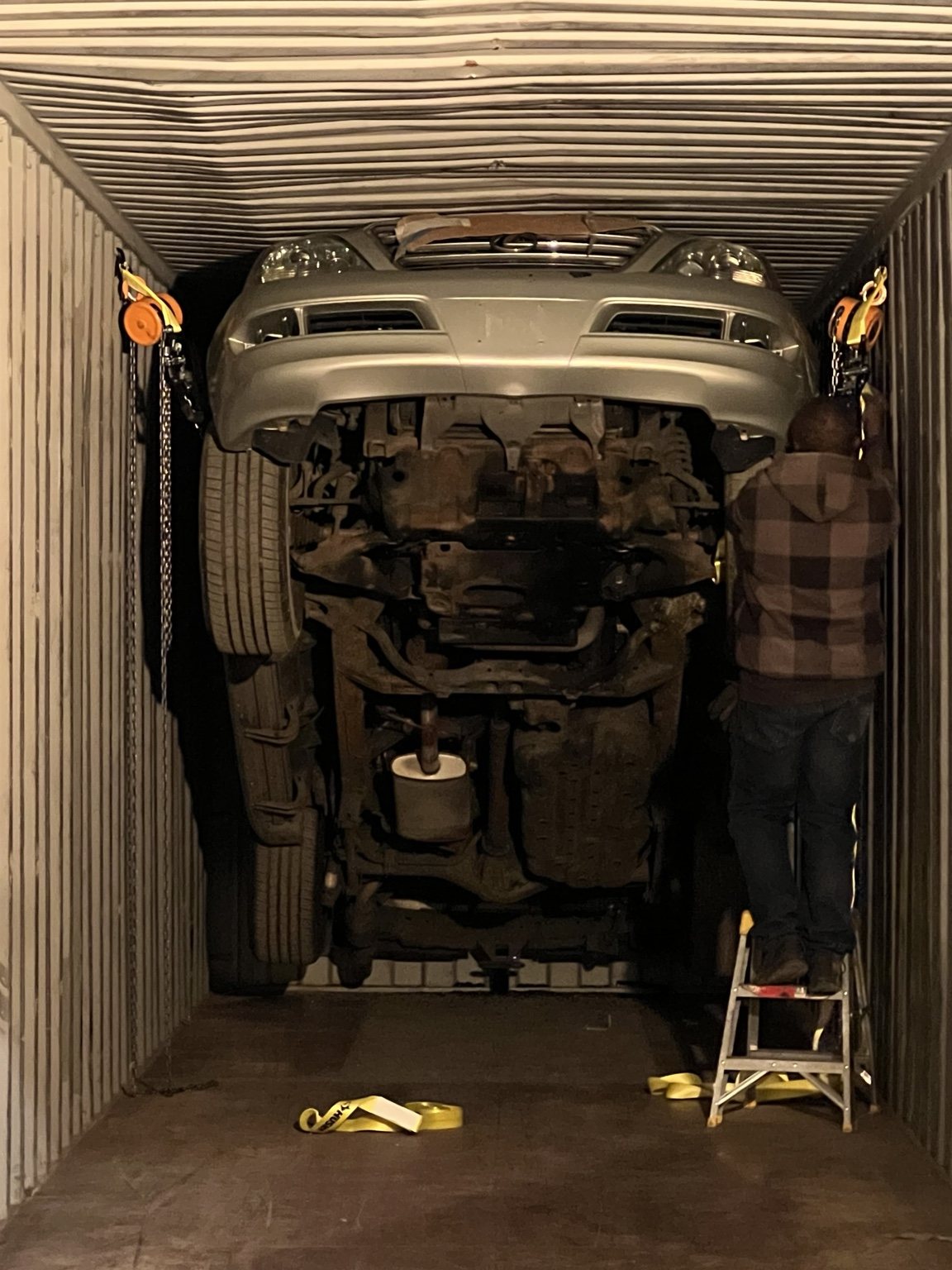 Vehicle secured inside container