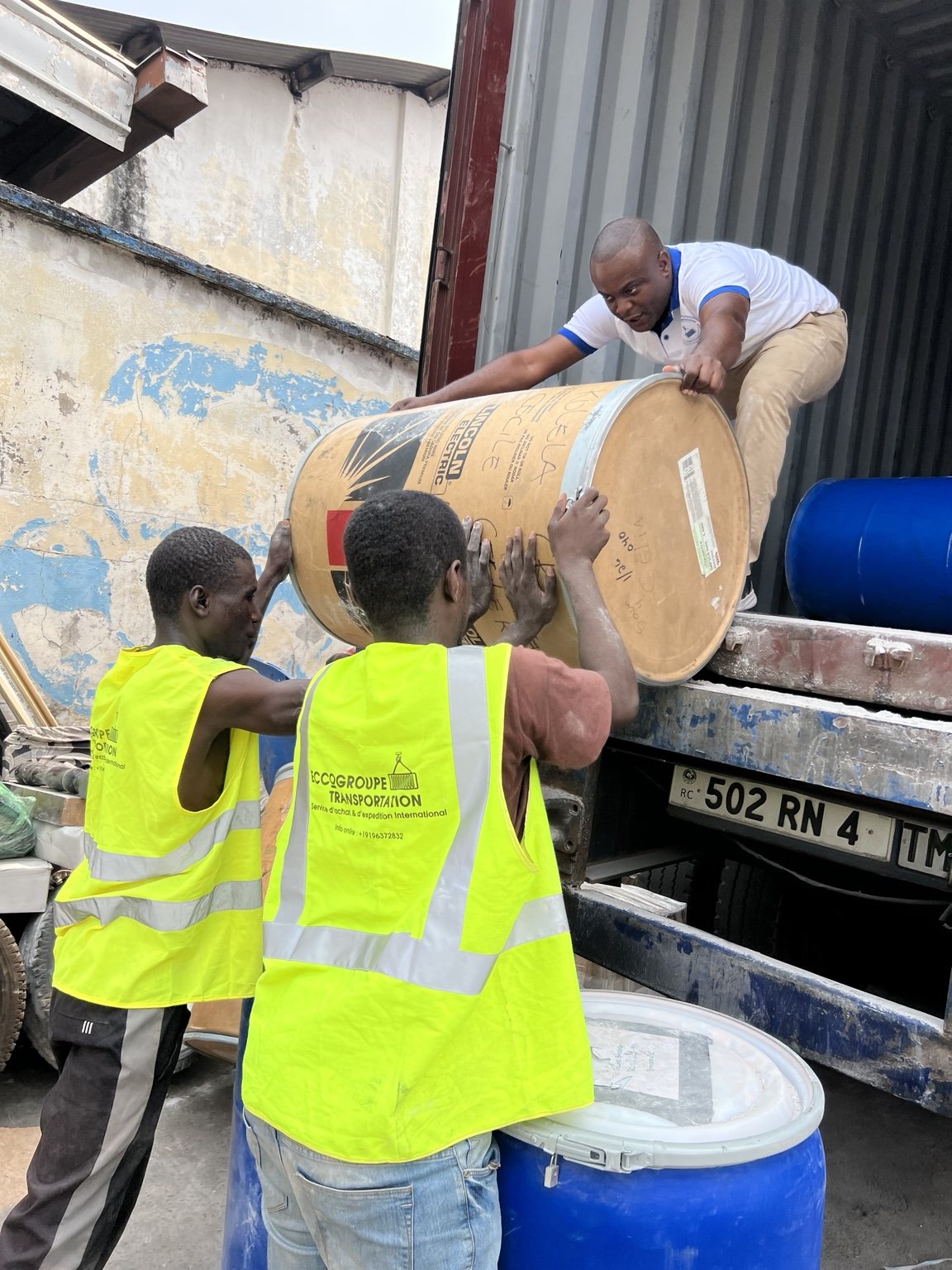 ECCOGROUPE team loading barrels